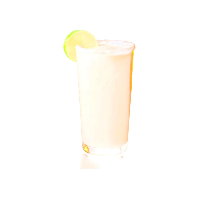 Lassi Raita drink: thick creamy pale white yogurt lassi in a tall glass, with a lime and a salted rim