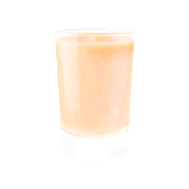 Mother's Milk cocktail: creamy pale butterscotch drink in a shot glass